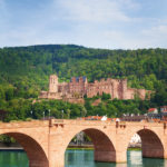 Alte Brucke bridge, Heidelberg castle and Neckar river during summer sunny day